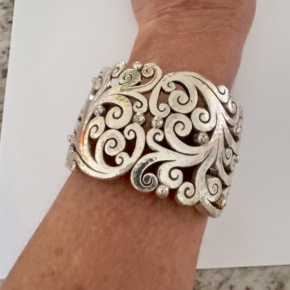 Wide silver tone cuff bracelet